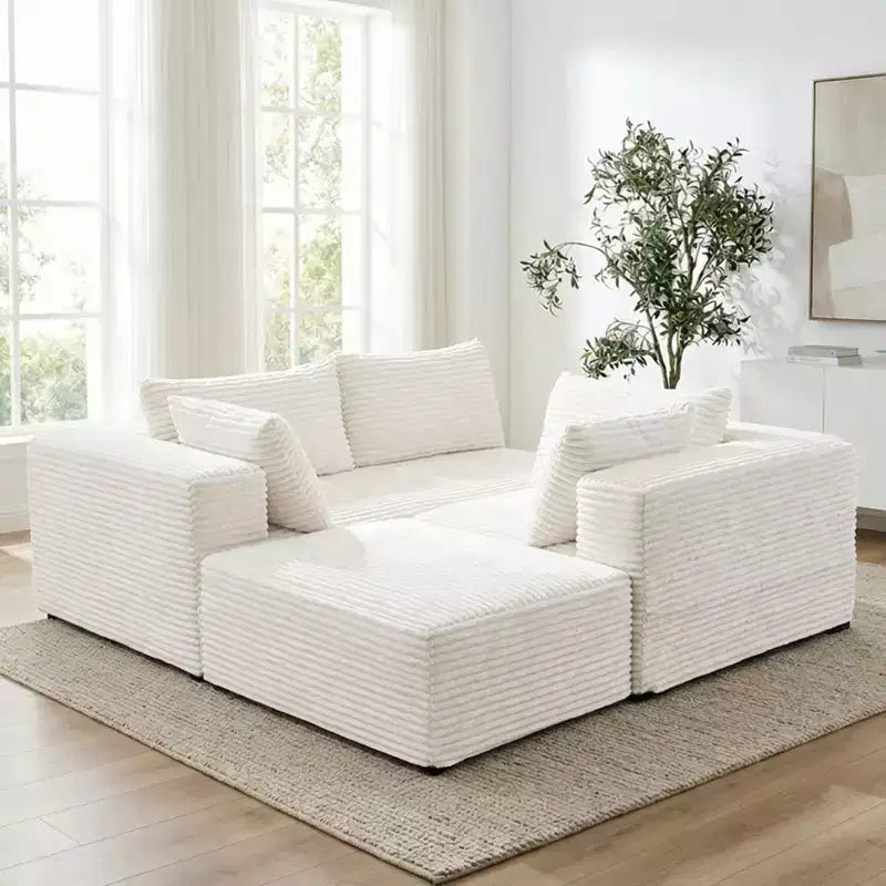 Divano componibile a L in velluto a coste oversize con chaise longue, design modulare, nero